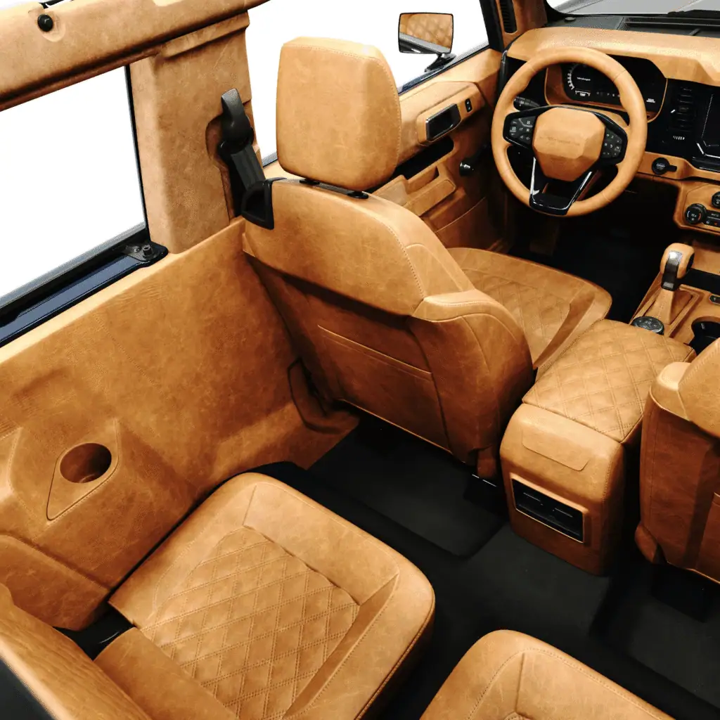Luxurious vintage-inspired car interior with tan leather upholstery, quilted seats, and classic design elements, showcasing timeless elegance and modern craftsmanship perfect for vintage modern enthusiasts.