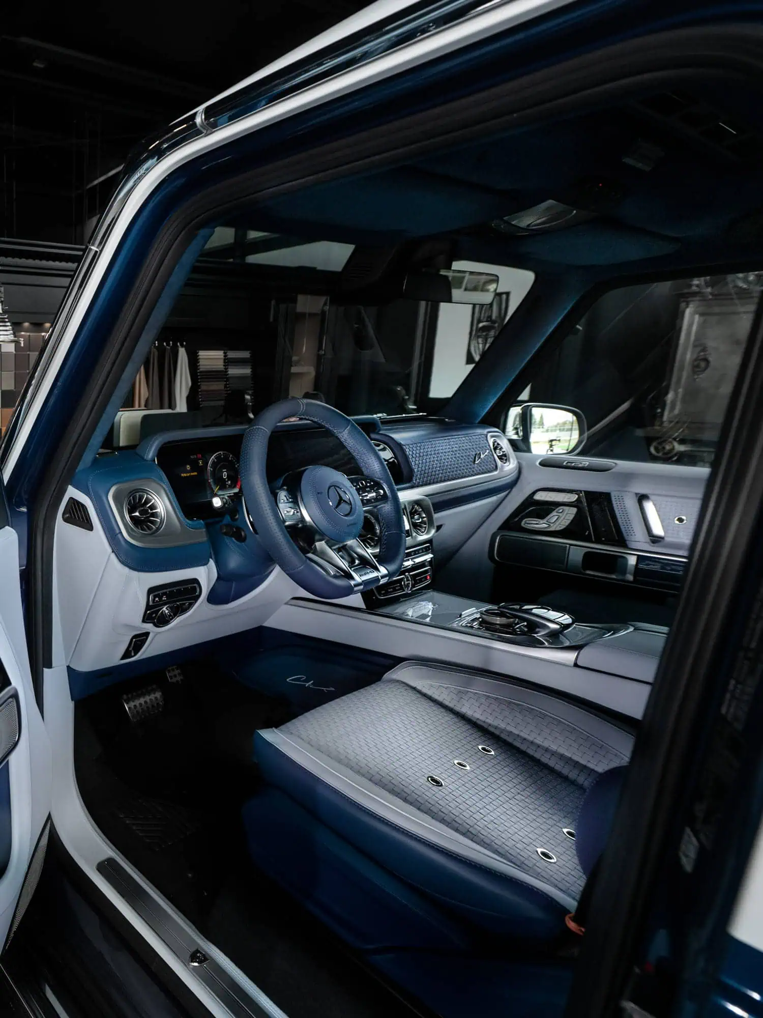 An interior view of a luxury Mercedes-Benz SUV, highlighting sophisticated and modern design features perfect for luxury vehicle enthusiasts.