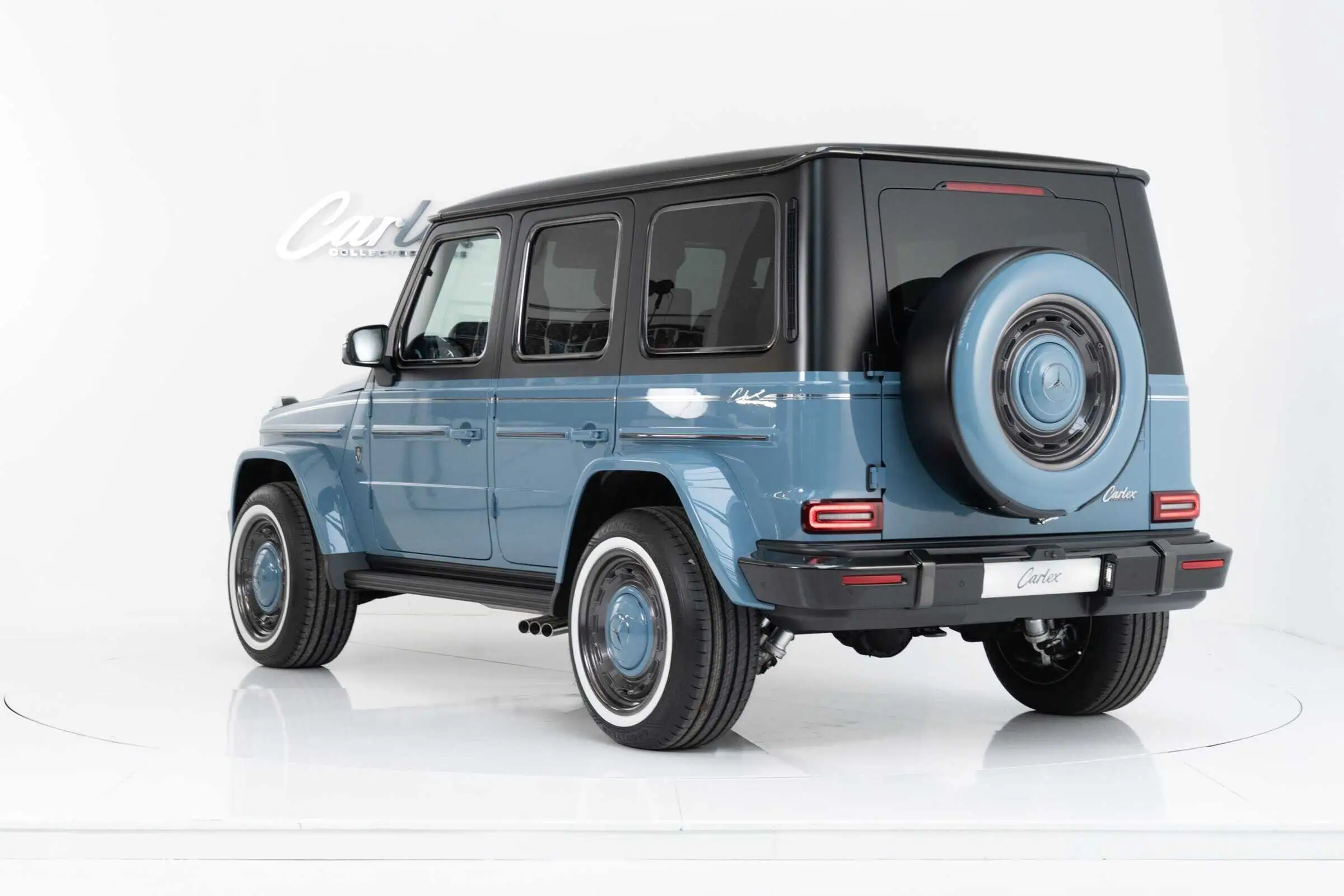 Luxury vintage Mercedes-Benz G-Class SUV, blue and black classic car with modern touches, ideal for vintage modern car enthusiasts and collectors seeking timeless automotive style.