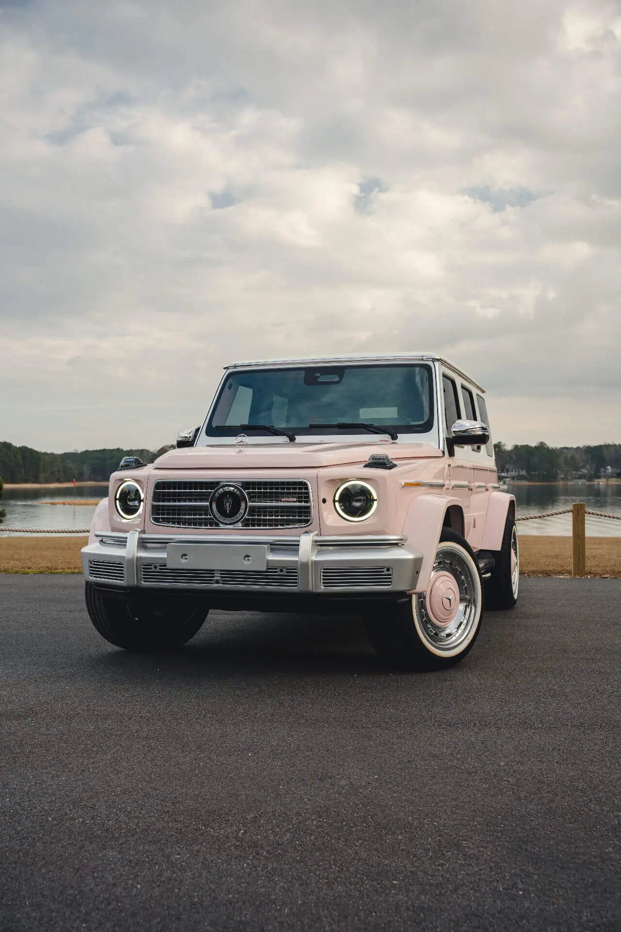 Carlex Vintage G-Wagon front view showcasing signature blush pink metallic paint and chrome vintage wheels